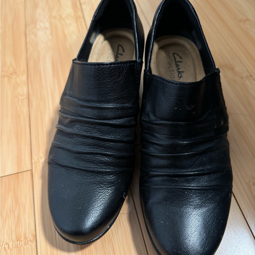 Clarks black shoes. Good as new! worn one or 2 times. Smoke free environment